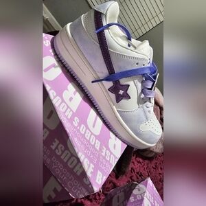 Purple & white shoes